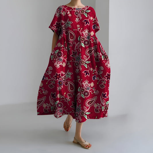 MEERI | KÜNSTLERISCHES MAXIKLEID MIT VINTAGE-BLUMENMUSTER UND UNBEKÜMMERTER ELEGANZ